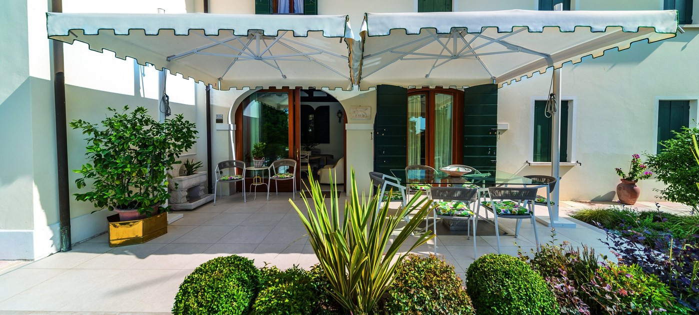 Two Swing umbrellas over terrace